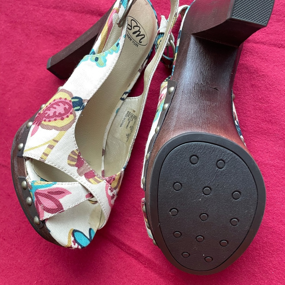 New beautiful wooden heel sandals with studs.
